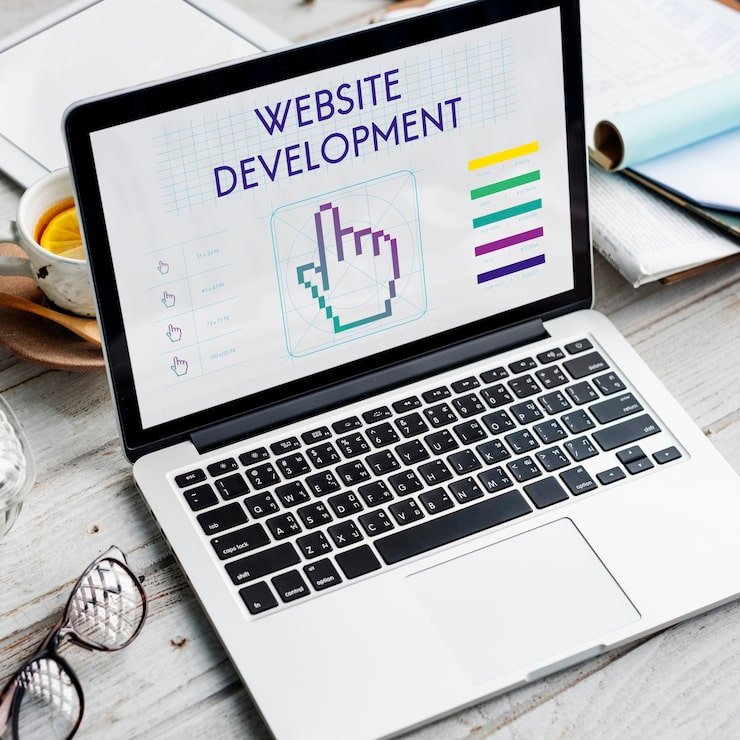 Website development shown on a laptop screen